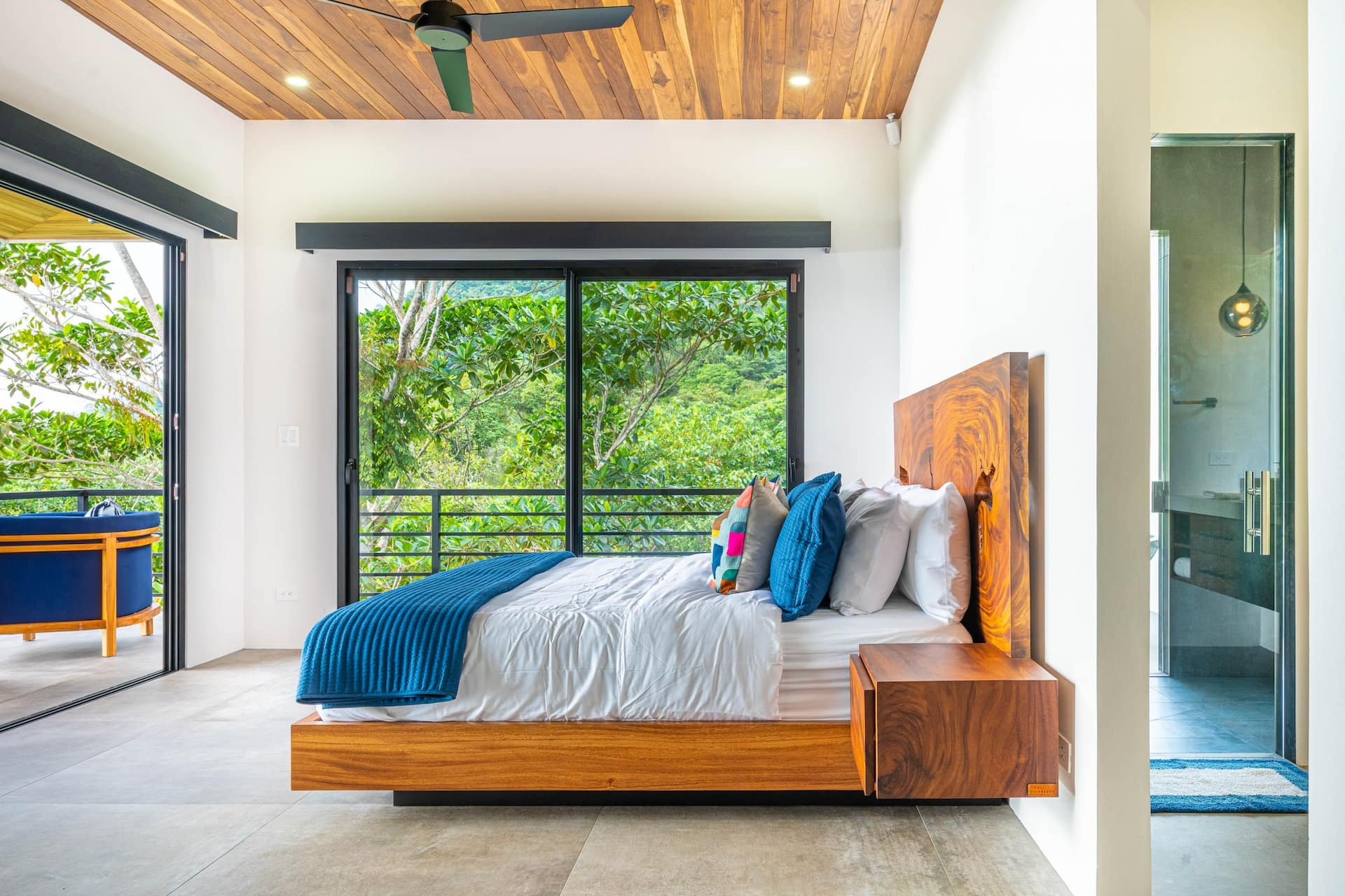 A king ensuite bedroom with ocean view