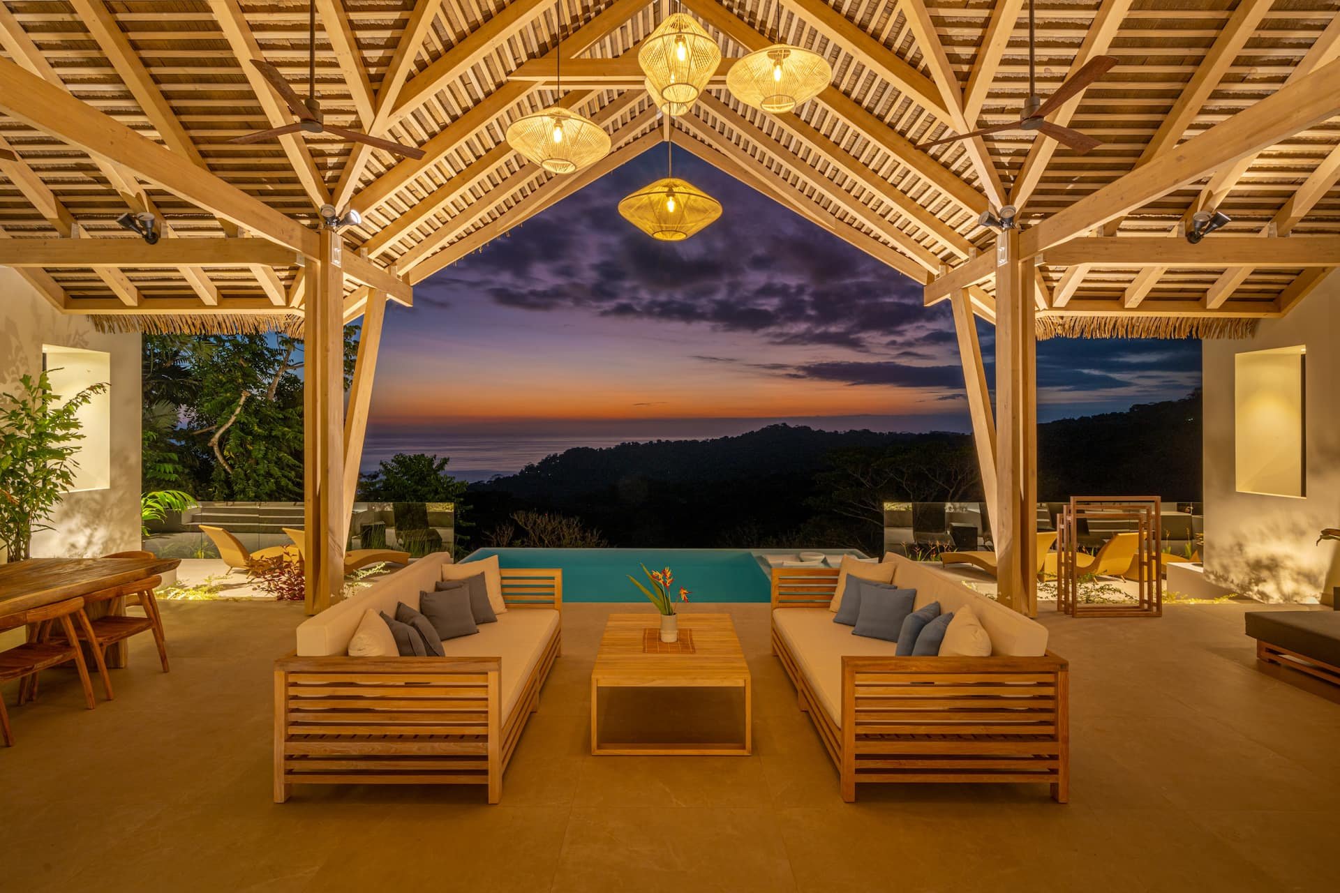 Casa Frenchie — ocean-view infinity pool and main house set in the Dominical jungle