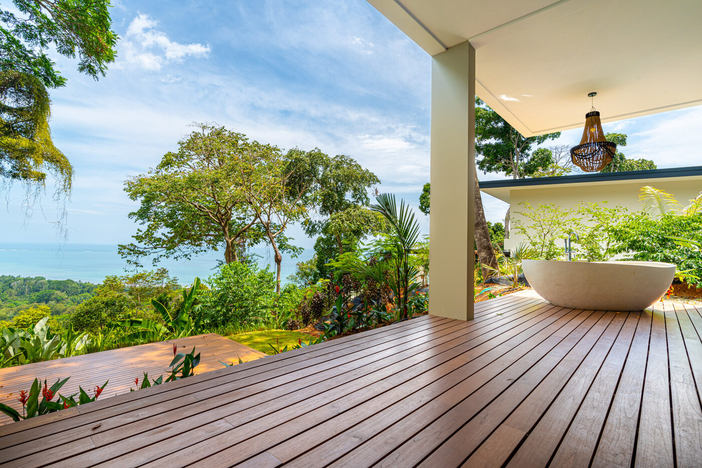 Casa LaVista — a freestanding tub on the deck with an open ocean and rainforest view