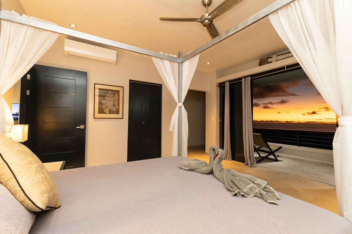 Villa Cielo Azul — The master suite with king canopy bed
